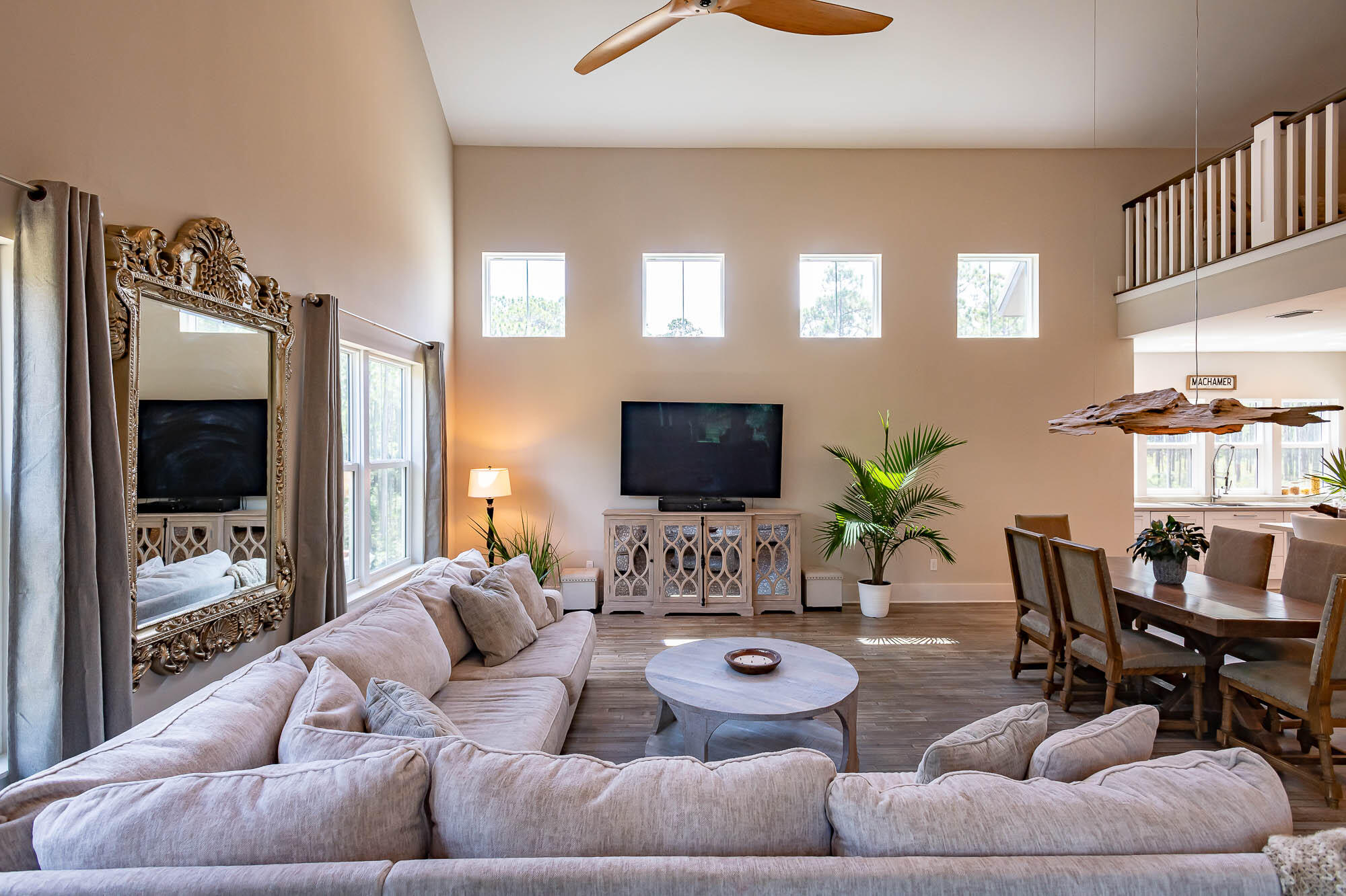 770 North Church Street Santa Rosa Beach, FL 32459 - Photo 14 of 85 a living room with furniture and a flat screen tv