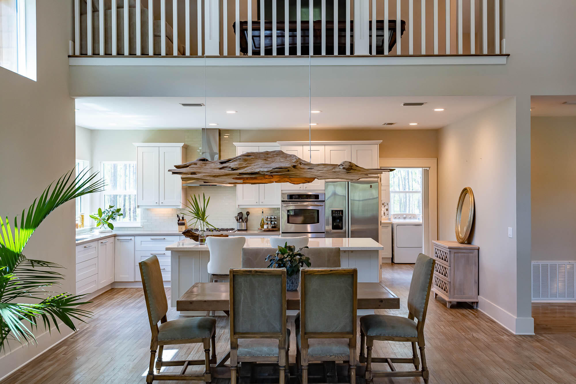 770 North Church Street Santa Rosa Beach, FL 32459 - Photo 16 of 85 a view of a dining room with furniture window and wooden floor
