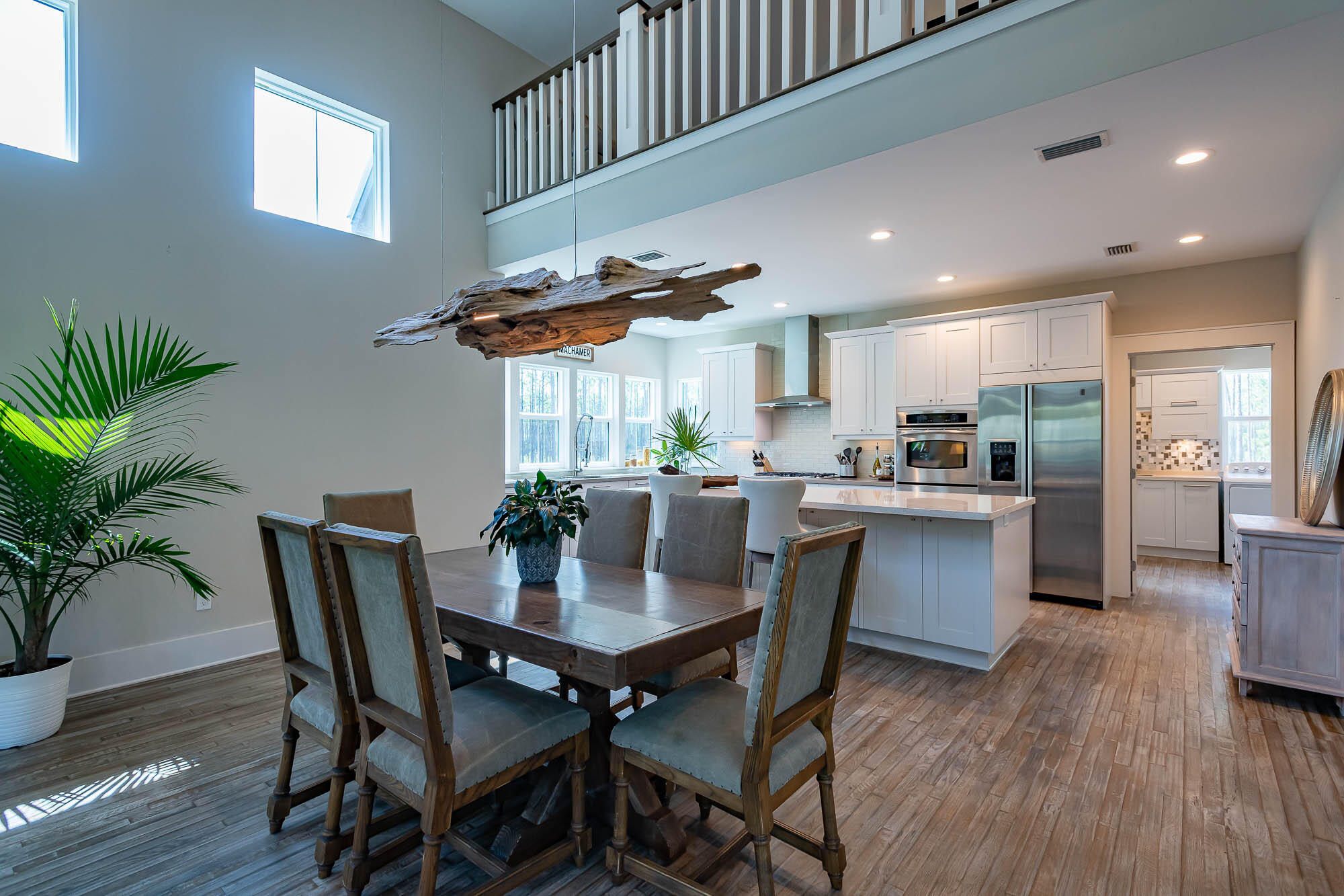 770 North Church Street Santa Rosa Beach, FL 32459 - Photo 22 of 85 a view of a dining room with furniture and wooden floor