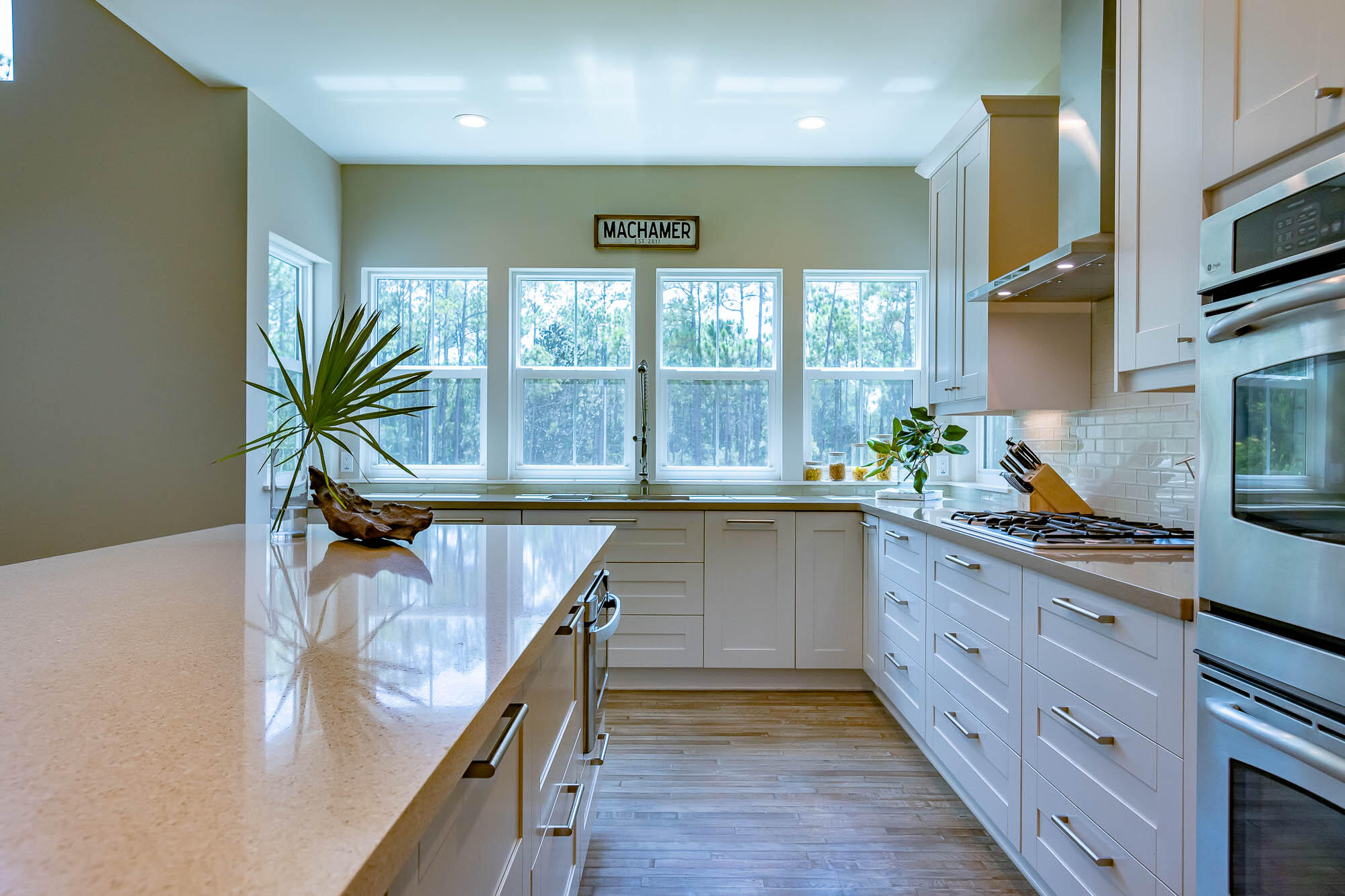 770 North Church Street Santa Rosa Beach, FL 32459 - Photo 26 of 85 a kitchen with sink a window and appliances