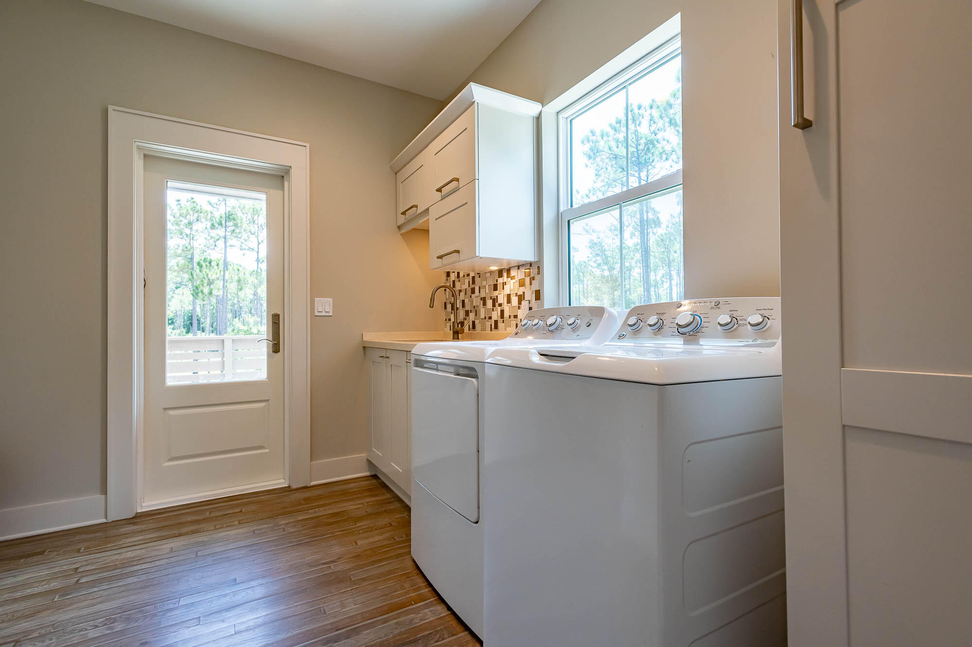 770 North Church Street Santa Rosa Beach, FL 32459 - Photo 32 of 85 a bathroom with a sink a vanity and a window