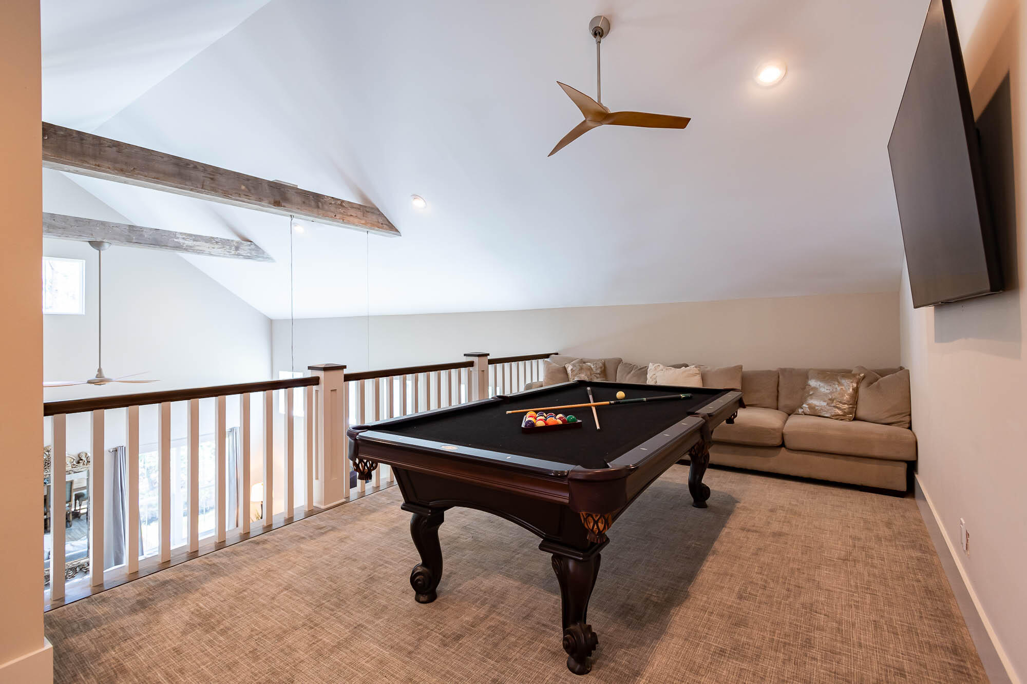 770 North Church Street Santa Rosa Beach, FL 32459 - Photo 51 of 85 a living room with furniture pool table and a flat screen tv