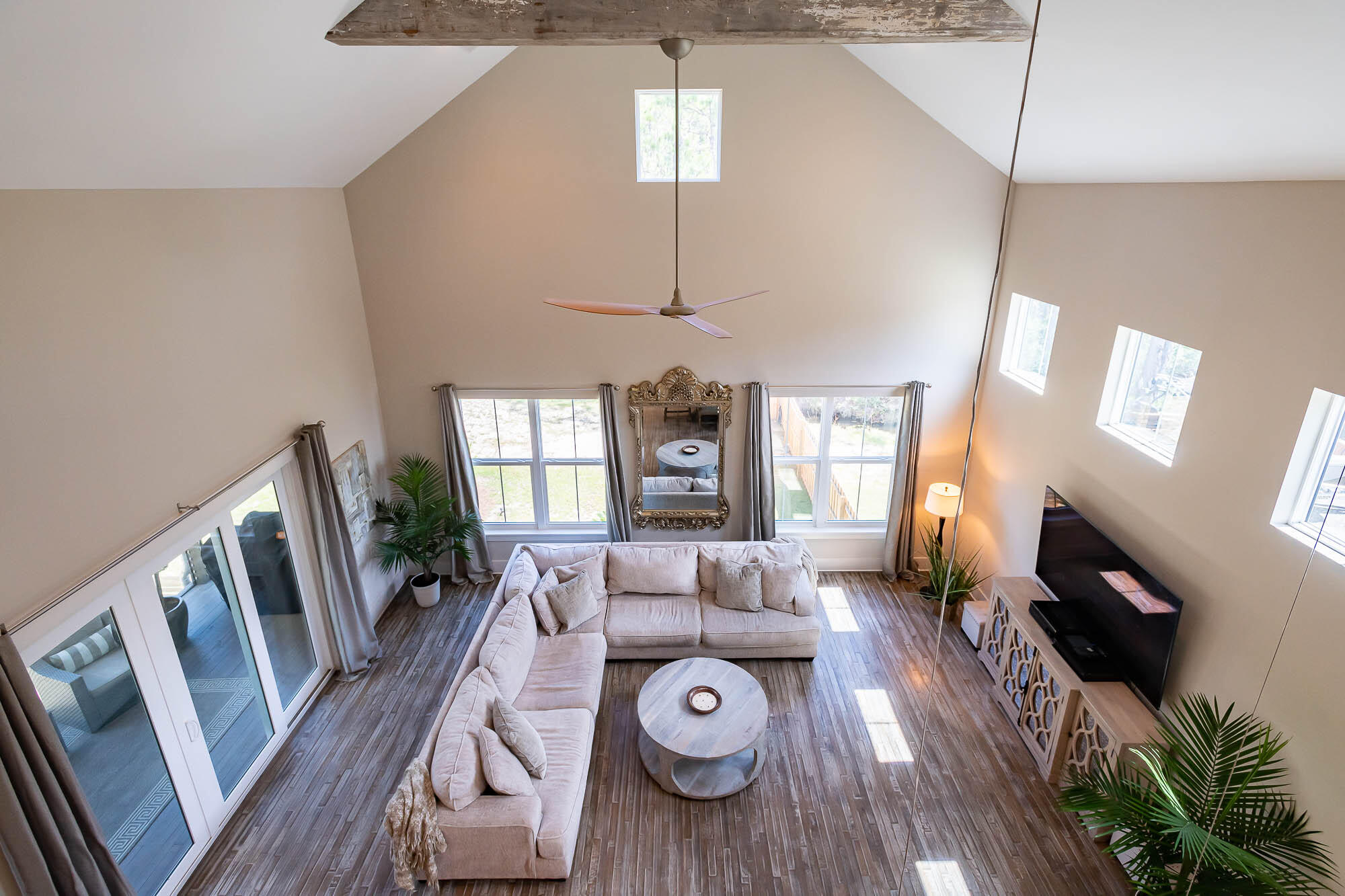 770 North Church Street Santa Rosa Beach, FL 32459 - Photo 52 of 85 a living room with furniture fireplace and flat screen tv