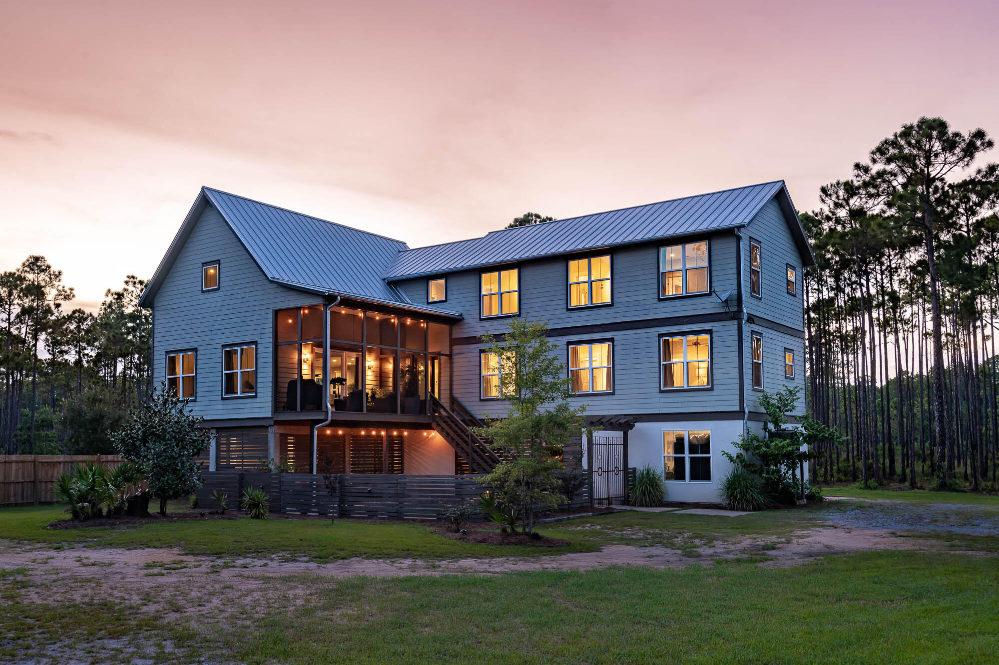 770 North Church Street Santa Rosa Beach, FL 32459 - Photo 79 of 85 a front view of a house with garden