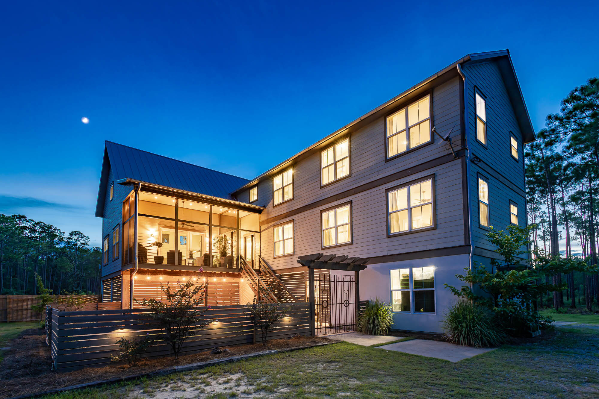 770 North Church Street Santa Rosa Beach, FL 32459 - Photo 83 of 85 a front view of a house with garden