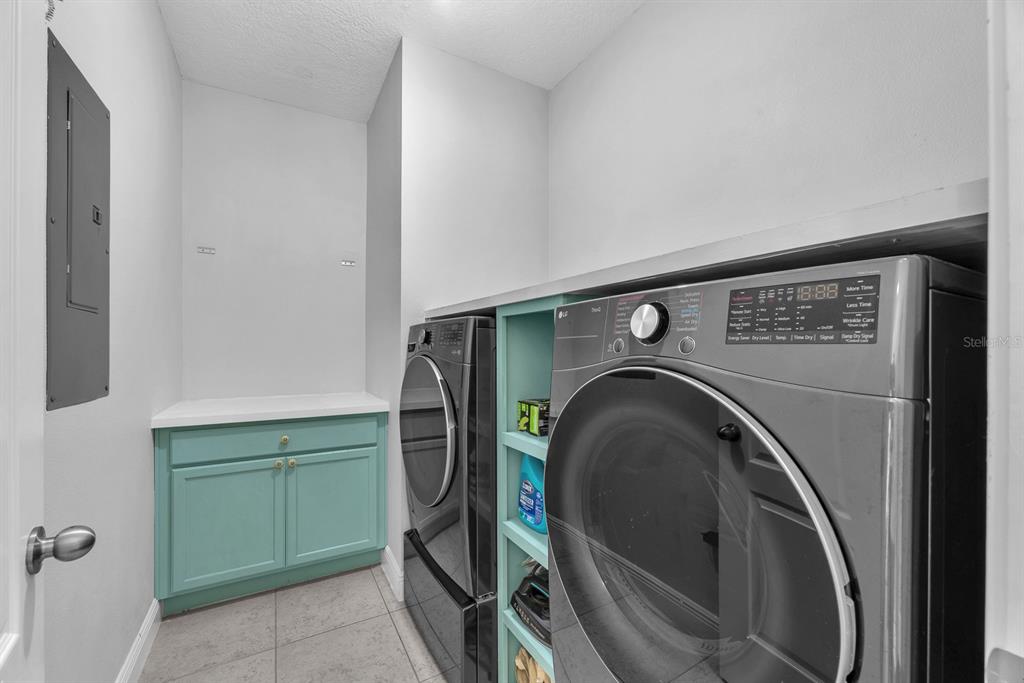 5310 Fishhawk Ridge Drive Lithia, FL 33547 - Photo 35 of 52 a utility room with dryer and washer