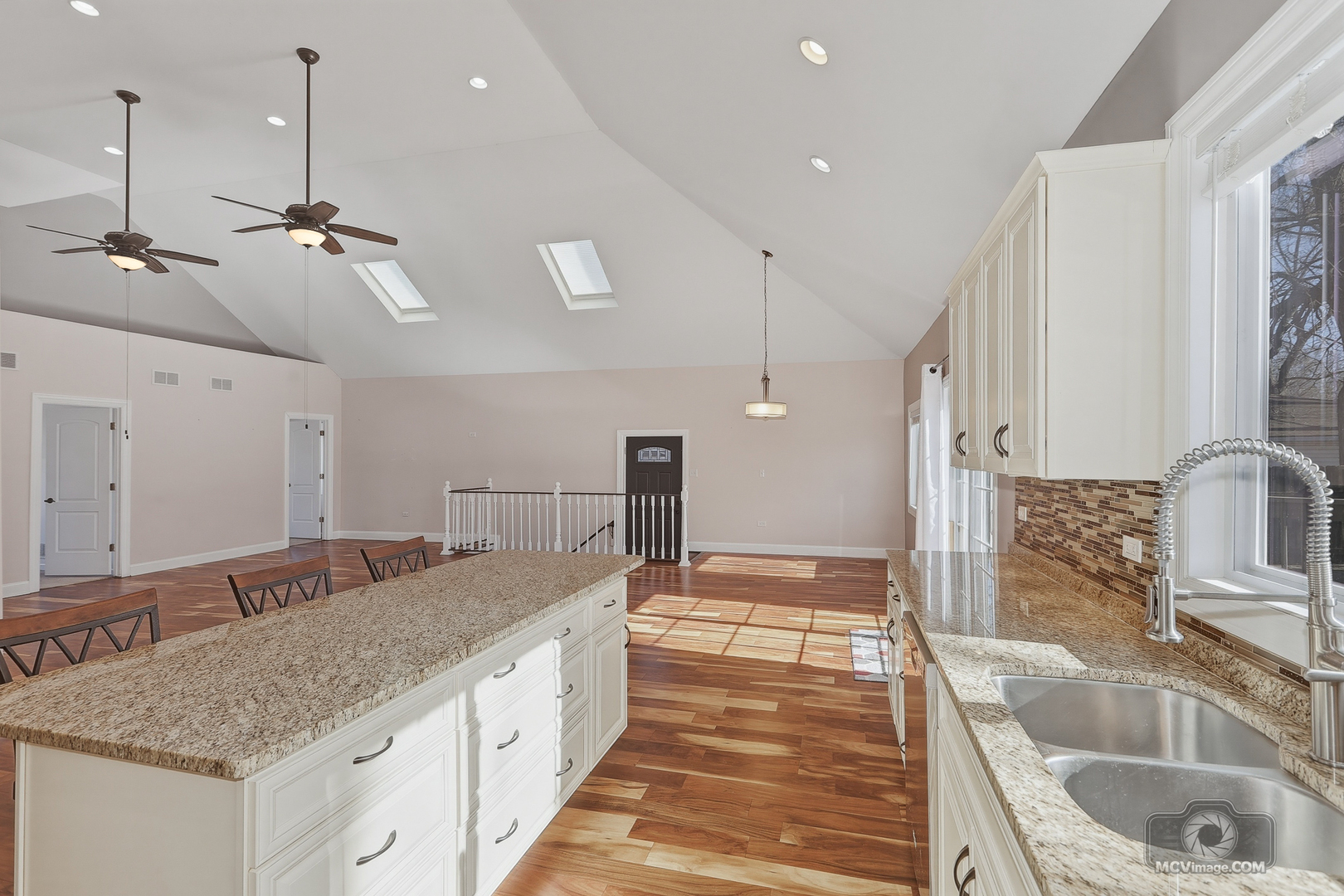 417 Thornton Street Lockport, IL 60441 - Photo 12 of 33 a bathroom with a granite countertop sink a mirror and shower