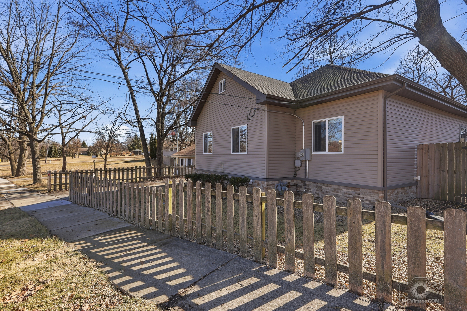 417 Thornton Street Lockport, IL 60441 - Photo 3 of 33 a front view of house with wooden fence