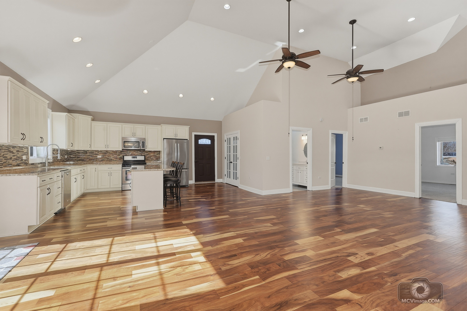 417 Thornton Street Lockport, IL 60441 - Photo 7 of 33 a view of a kitchen with kitchen island a counter top space appliances and cabinets