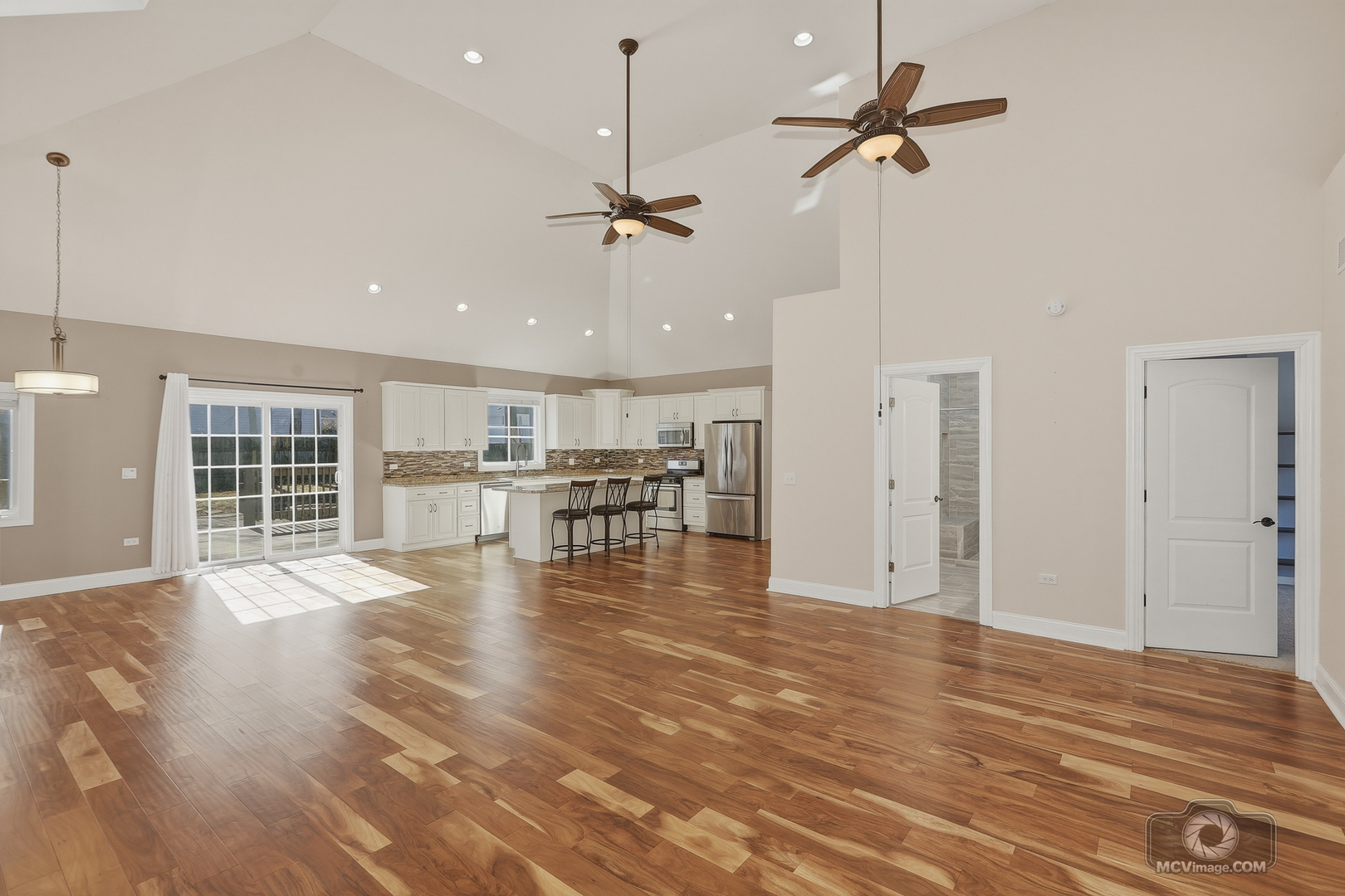 417 Thornton Street Lockport, IL 60441 - Photo 8 of 33 a view of empty room with wooden floor and fan