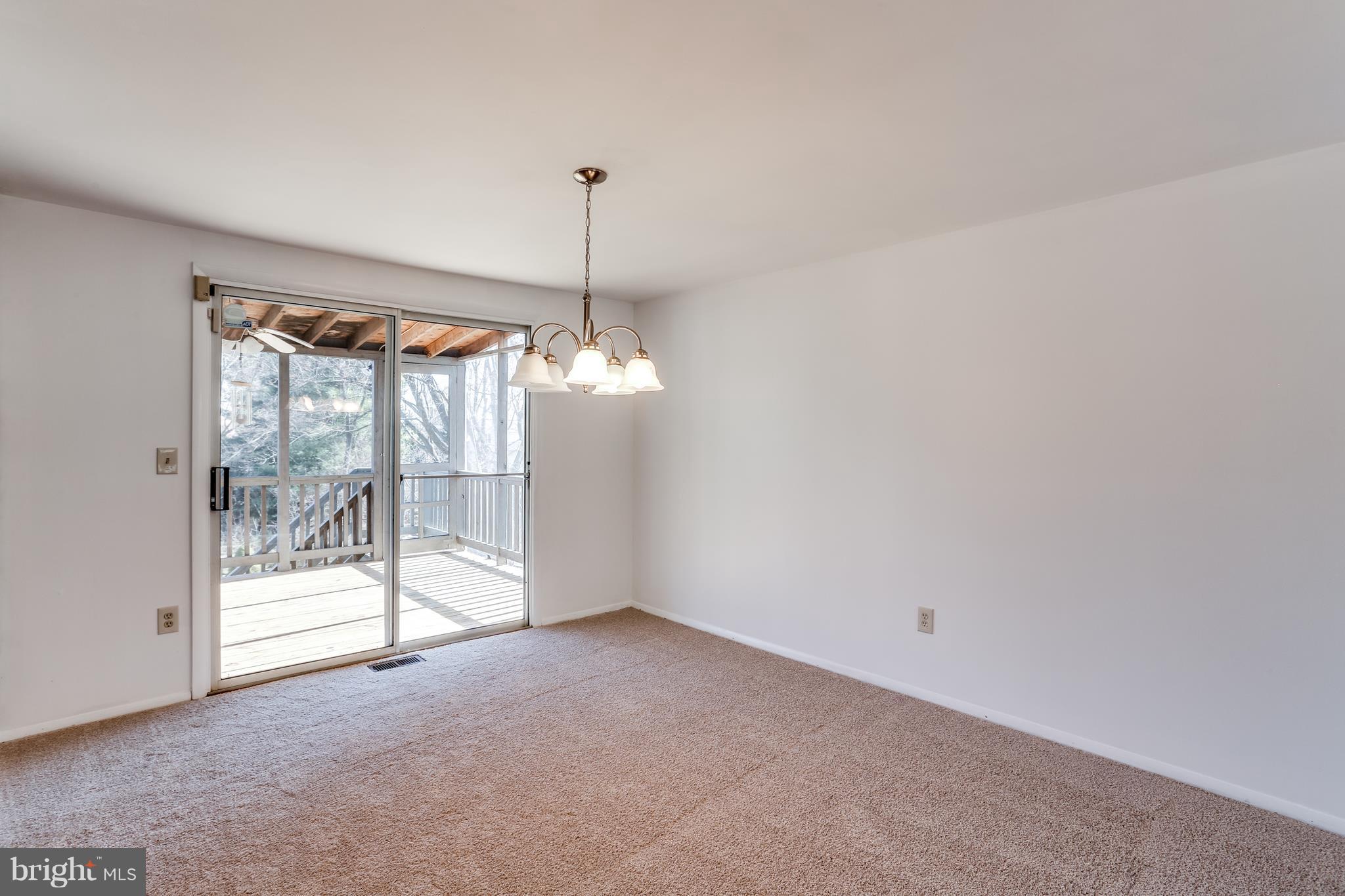 5129 West Running Brook Road Columbia, MD 21044 - Photo 19 of 29 DINING ROOM WITH ENTRANCE TO SCREENED PORCH