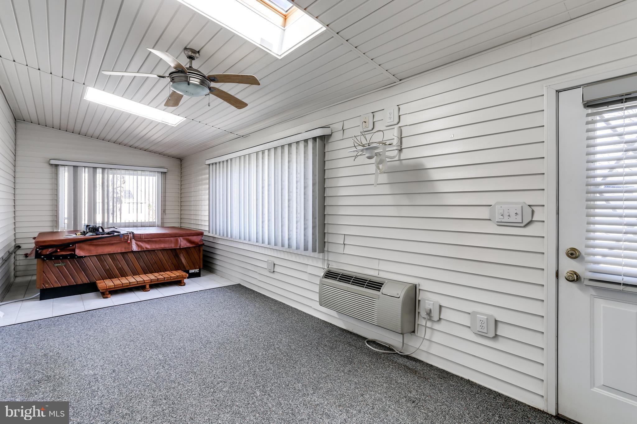 5129 West Running Brook Road Columbia, MD 21044 - Photo 27 of 29 HEATED AND COOLED 4 SEASON ROOM WITH HOT TUB