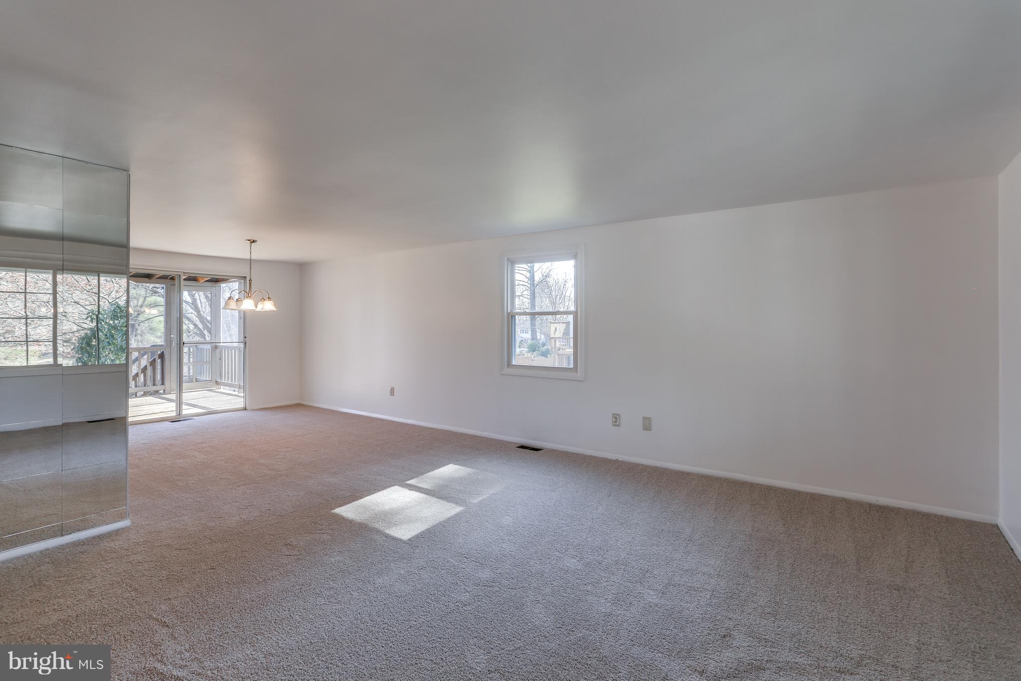 5129 West Running Brook Road Columbia, MD 21044 - Photo 4 of 29 MIRRORED WALL LIVING ROOM