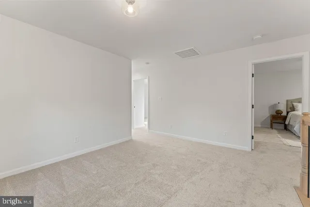 a view of a balcony with wooden floor