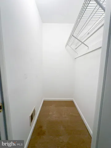 a view of a room with rack on the wall