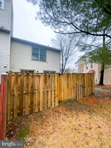 a view of a backyard of the house