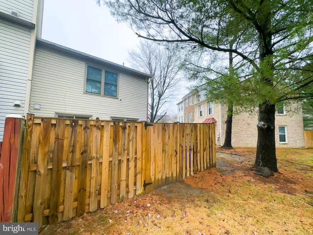 a view of a backyard of the house
