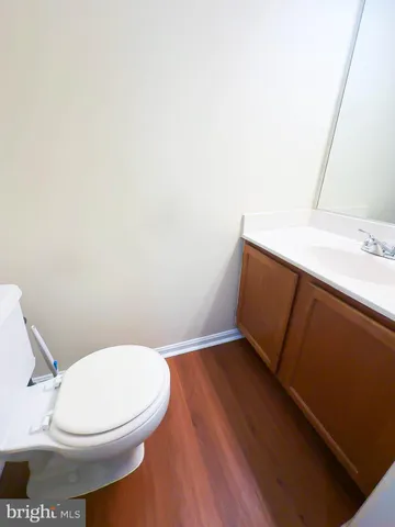 a bathroom with a toilet and a sink