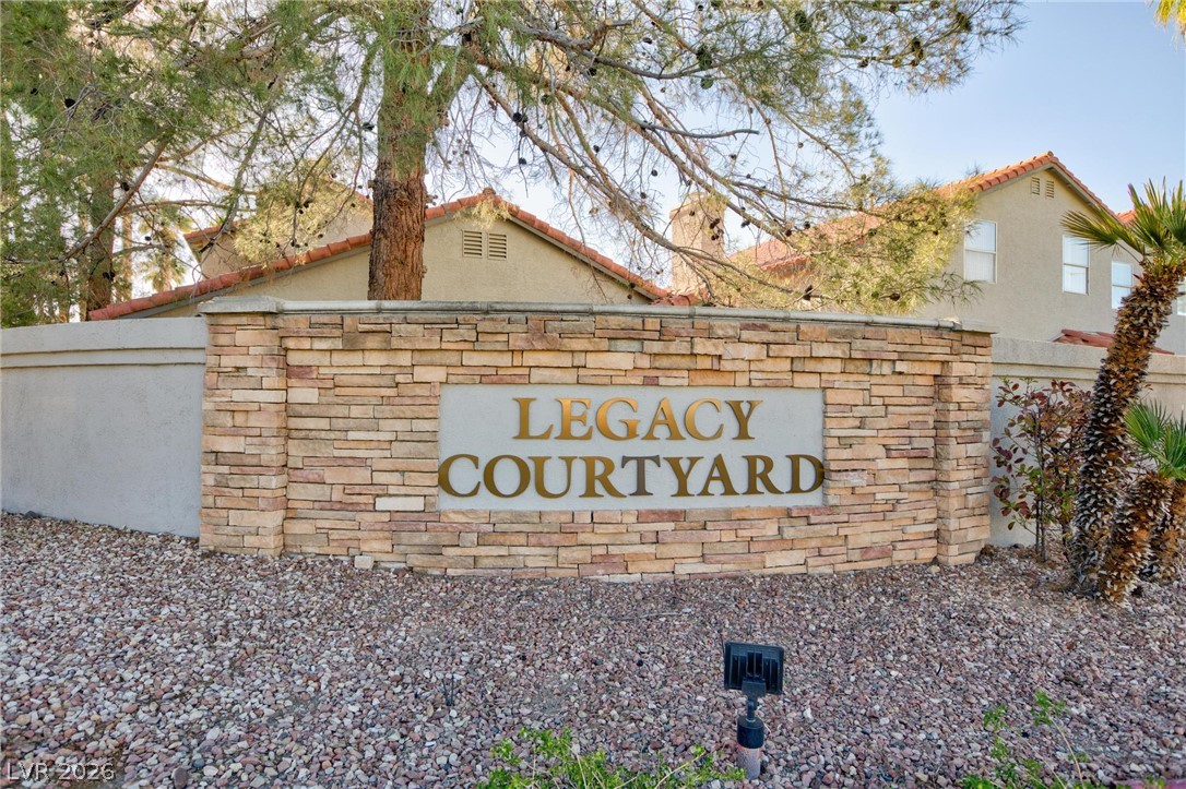 2246 Ramsgate Drive Henderson, NV 89074 - Photo 30 of 36 A welcoming stone-clad entrance marks the private community of Legacy Courtyard.