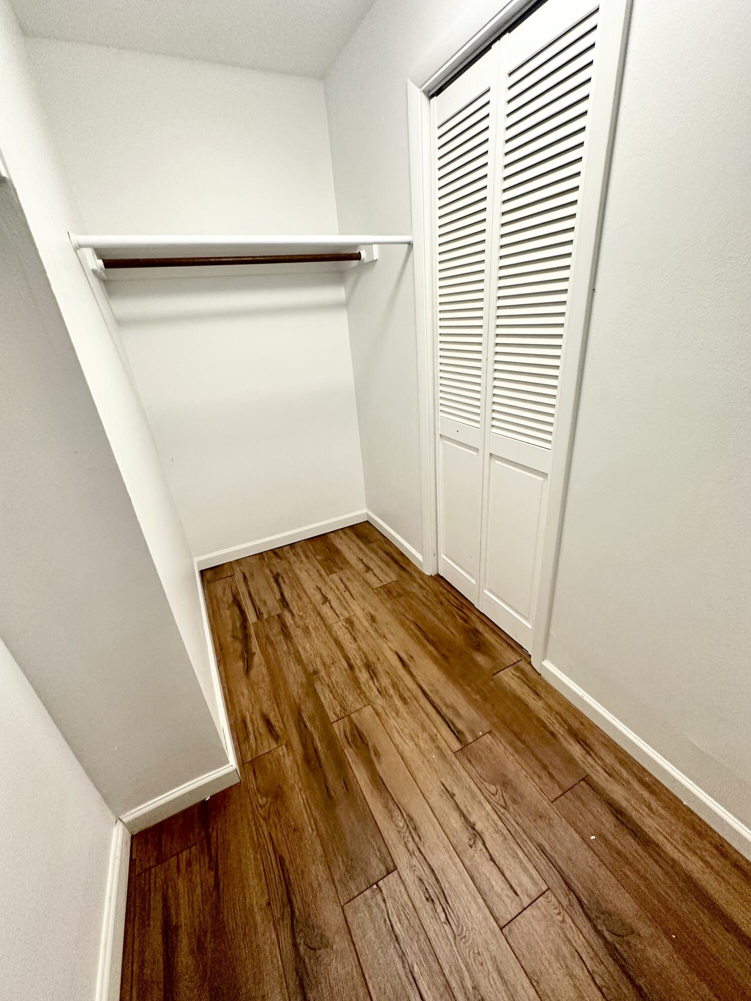 10821 North Military Trail, Unit 21 Palm Beach Gardens, FL 33410 - Photo 25 of 34 a view of wooden floor