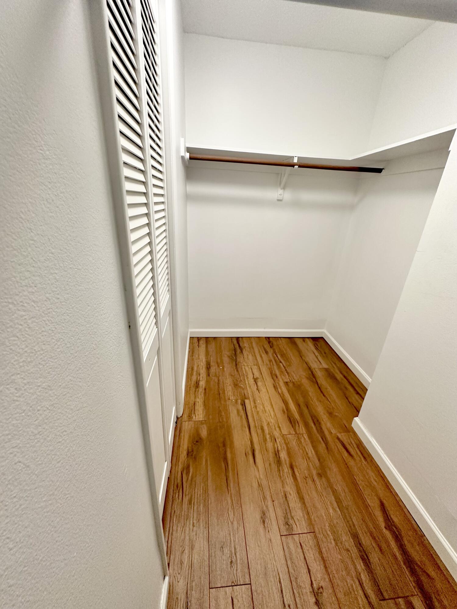 10821 North Military Trail, Unit 21 Palm Beach Gardens, FL 33410 - Photo 26 of 34 a view of wooden floor