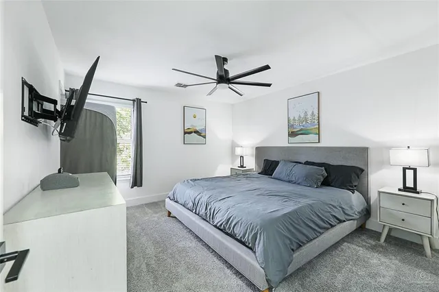 a living room with furniture and window