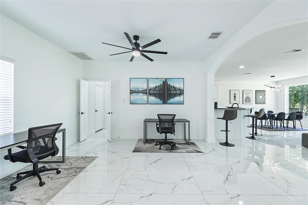 3805 Overlook Court The Colony, TX 75056 - Photo 24 of 29 a view of a livingroom with furniture and a window