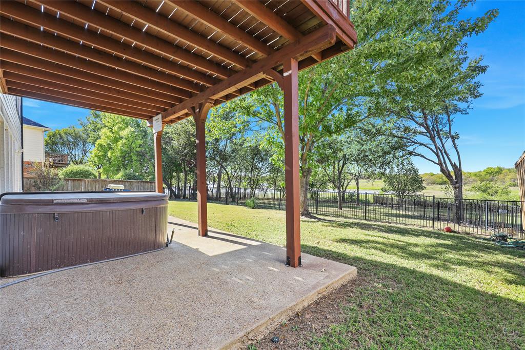 3805 Overlook Court The Colony, TX 75056 - Photo 28 of 29 a view of a backyard with green space