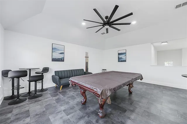 a bathroom with a double vanity sink and mirror