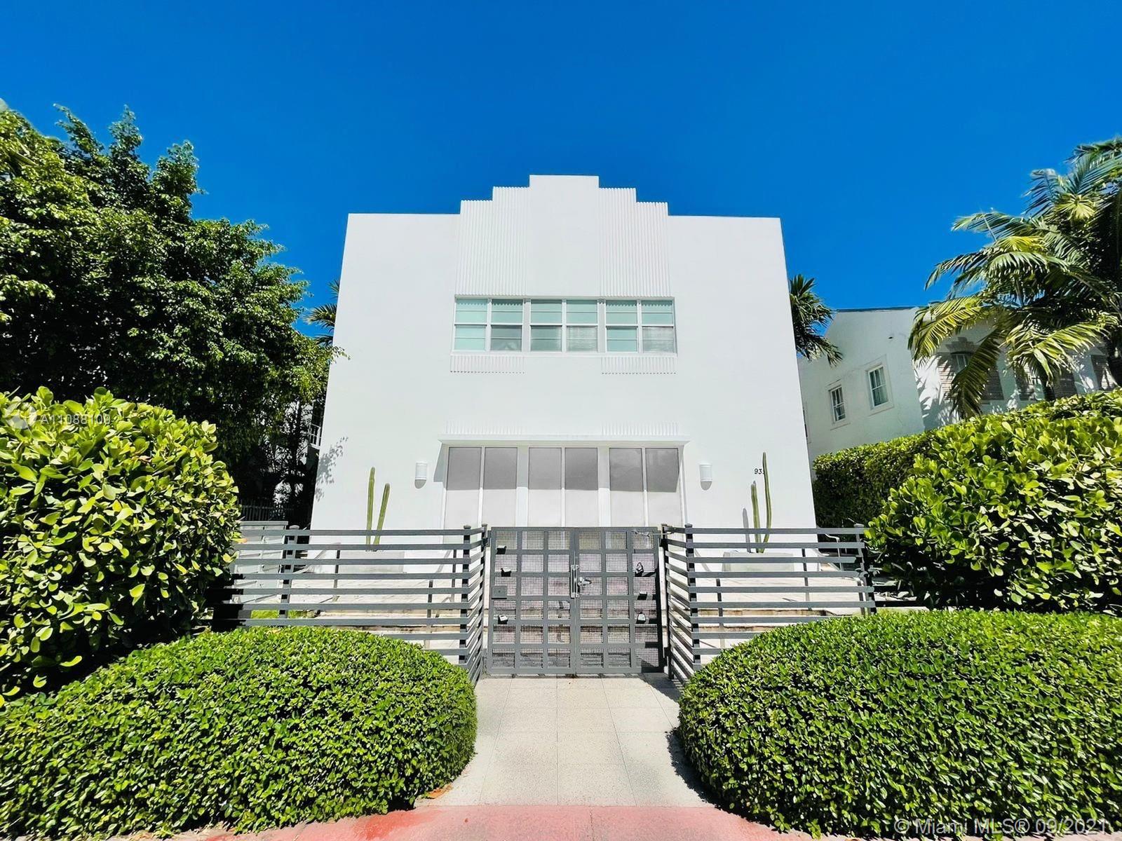935 Euclid Avenue, Unit 5 Miami Beach, FL 33139 - Photo 1 of 27 a view of a house with a small yard