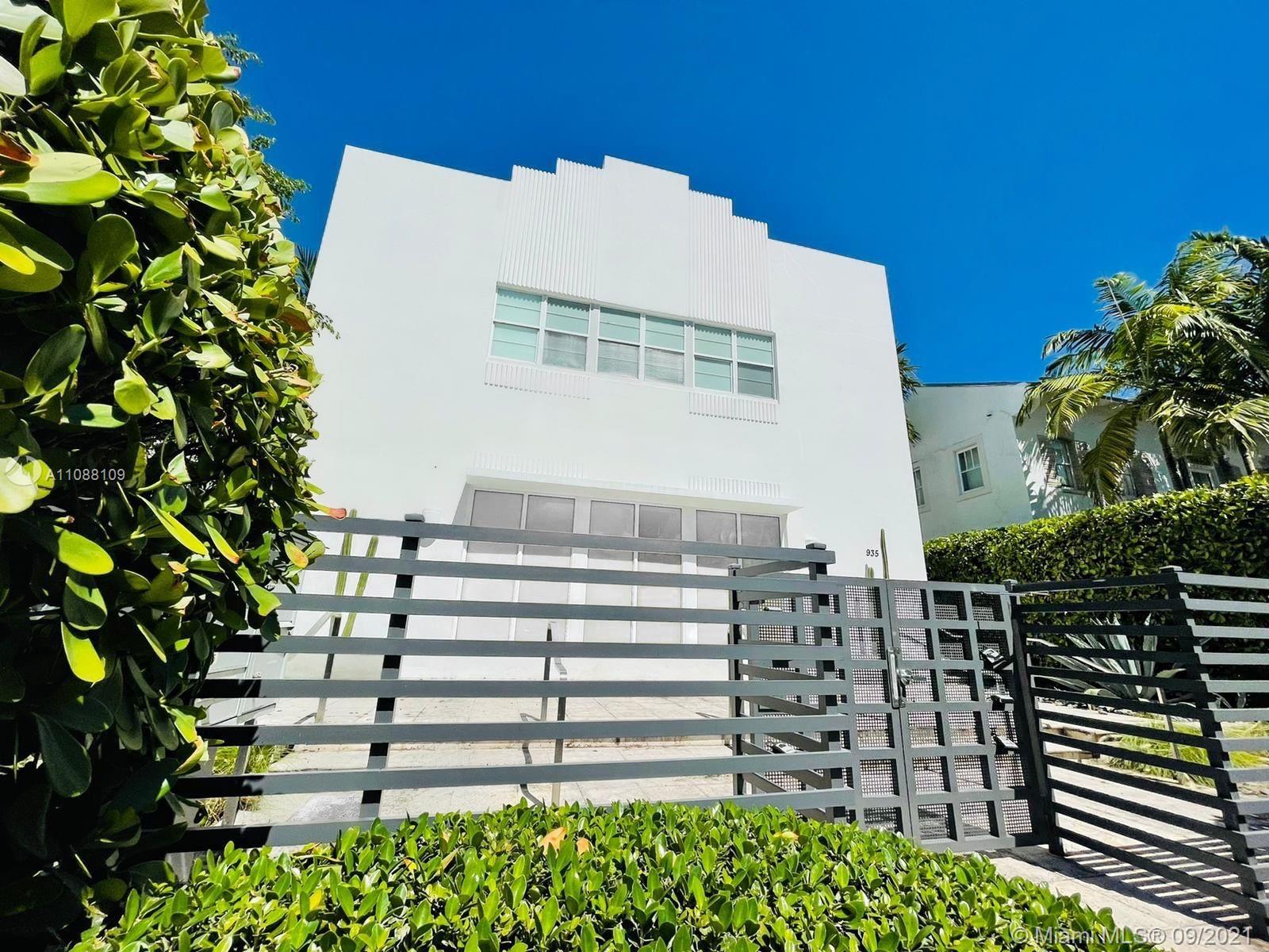 935 Euclid Avenue, Unit 5 Miami Beach, FL 33139 - Photo 2 of 27 a view of a house with a flower garden