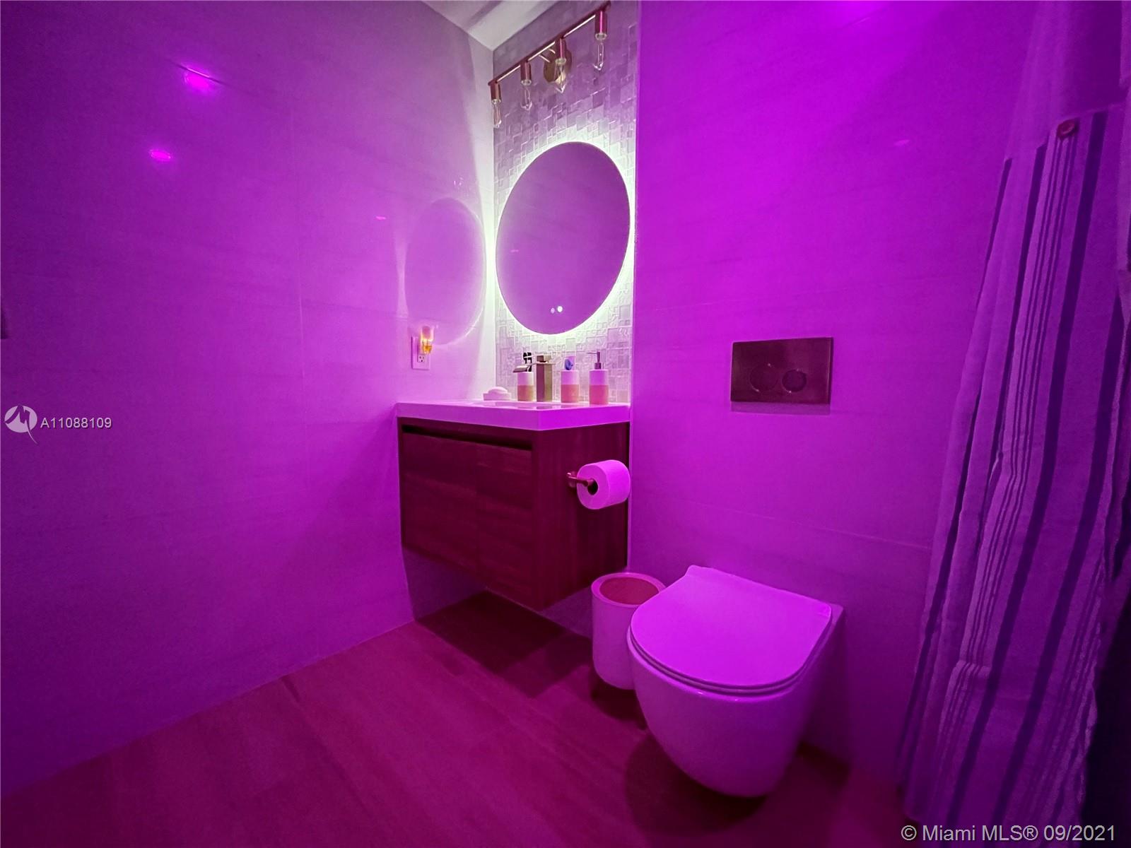 935 Euclid Avenue, Unit 5 Miami Beach, FL 33139 - Photo 18 of 27 a bathroom with a toilet