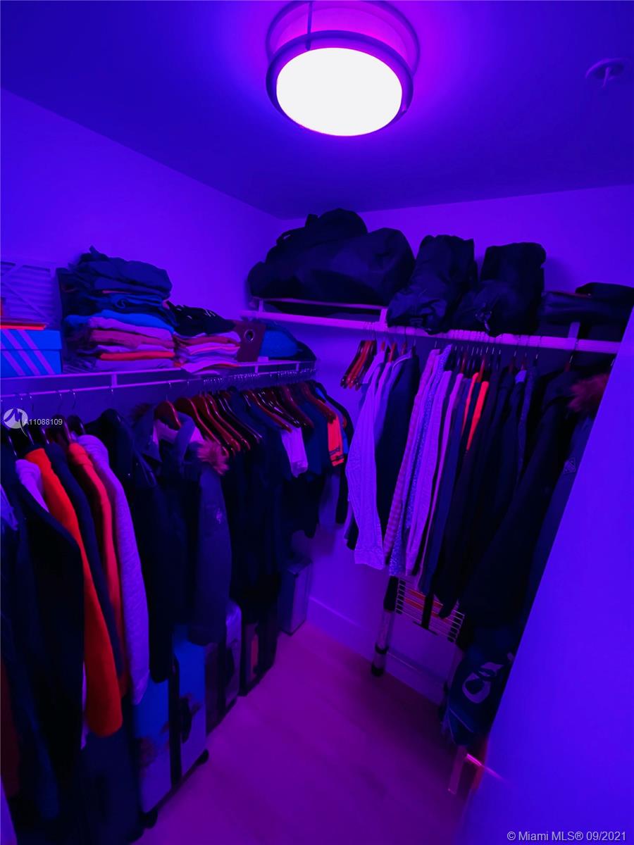 935 Euclid Avenue, Unit 5 Miami Beach, FL 33139 - Photo 27 of 27 a view of a room with red bed