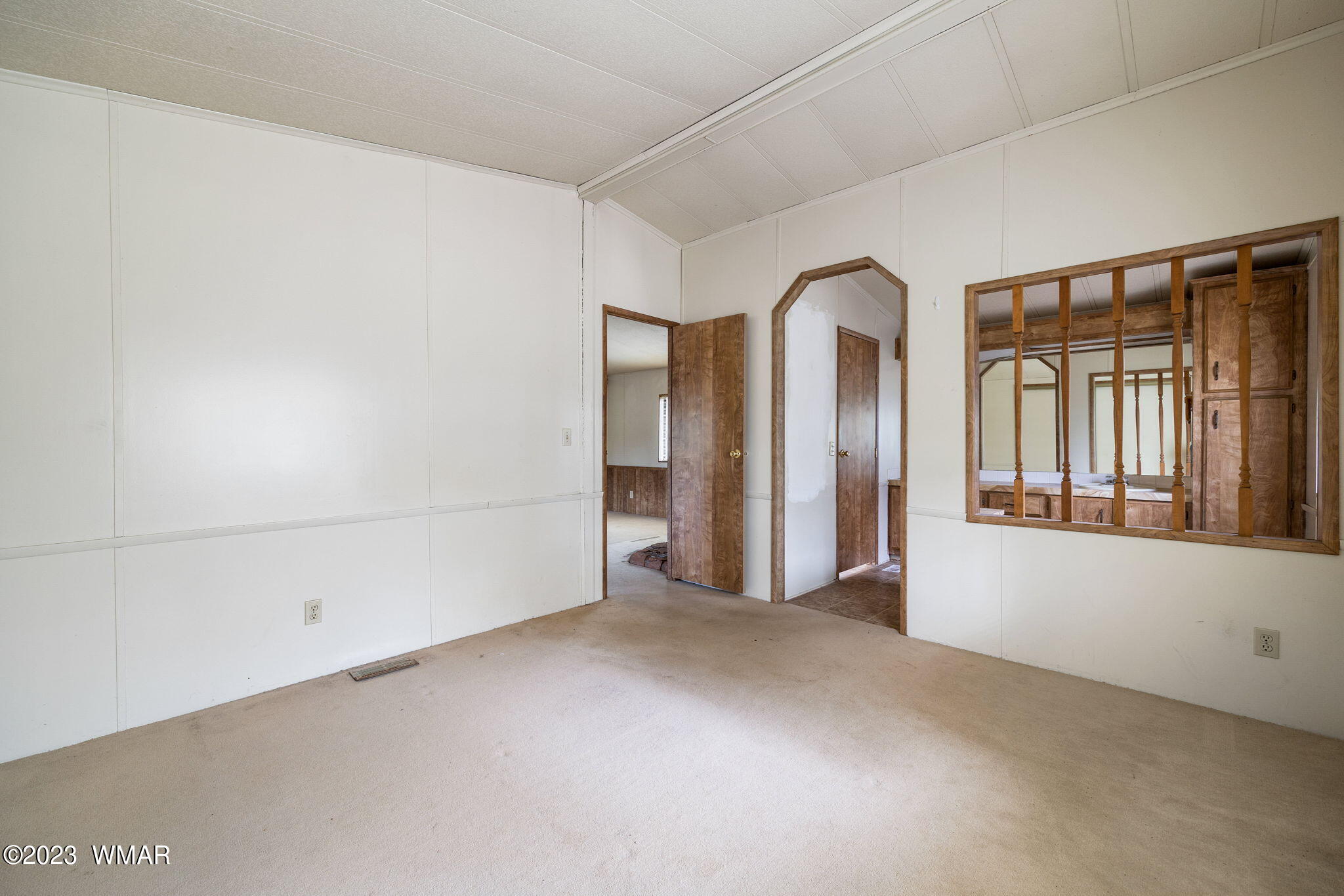 3067 Ponderosa Road Overgaard, AZ 85933 - Photo 18 of 32 a view of a room with large windows