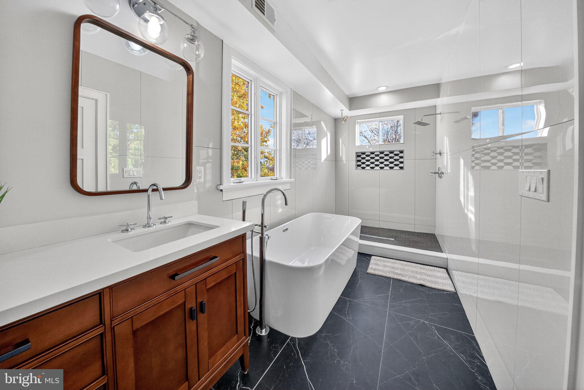 2017 Fulton Place Northeast Washington, DC 20018 - Photo 31 of 52 Primary Bath with Tub & Shower