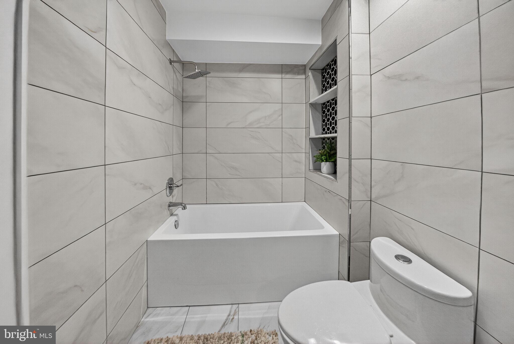 2017 Fulton Place Northeast Washington, DC 20018 - Photo 44 of 52 Lower Level Bath 1