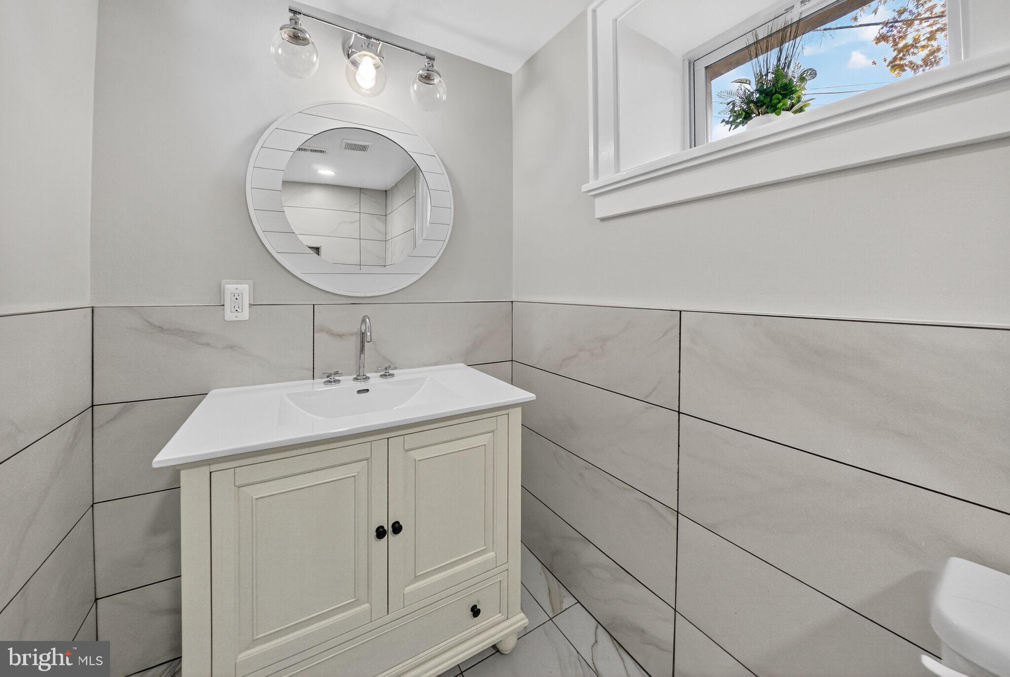 2017 Fulton Place Northeast Washington, DC 20018 - Photo 47 of 52 Lower Level Bath 2