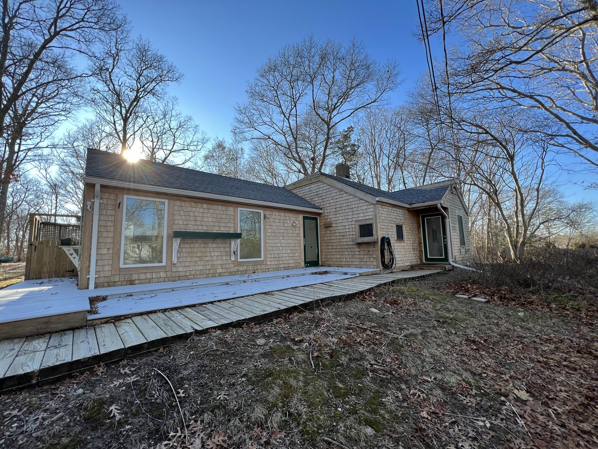 10 Freedom Road, Unit 10 Forestdale, MA 02644 - Photo 1 of 27 a front view of house with yard