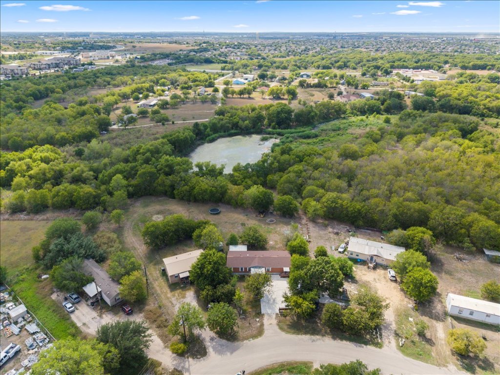 114 Dove Lane Kyle, TX 78640 - Photo 22 of 24 an aerial view of mountain with residential house and lake view