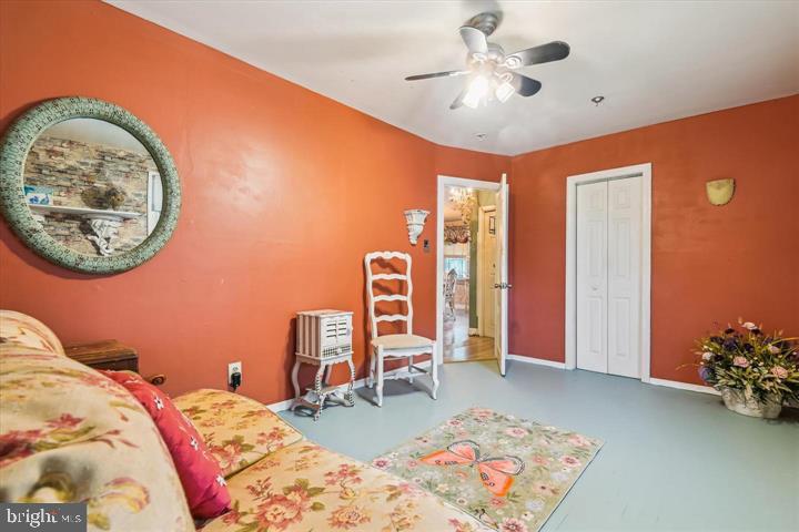 947 Martin Road Baltimore, MD 21221 - Photo 7 of 16 Charming room with vibrant orange walls.