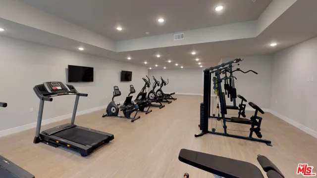 a view of a room with gym equipment