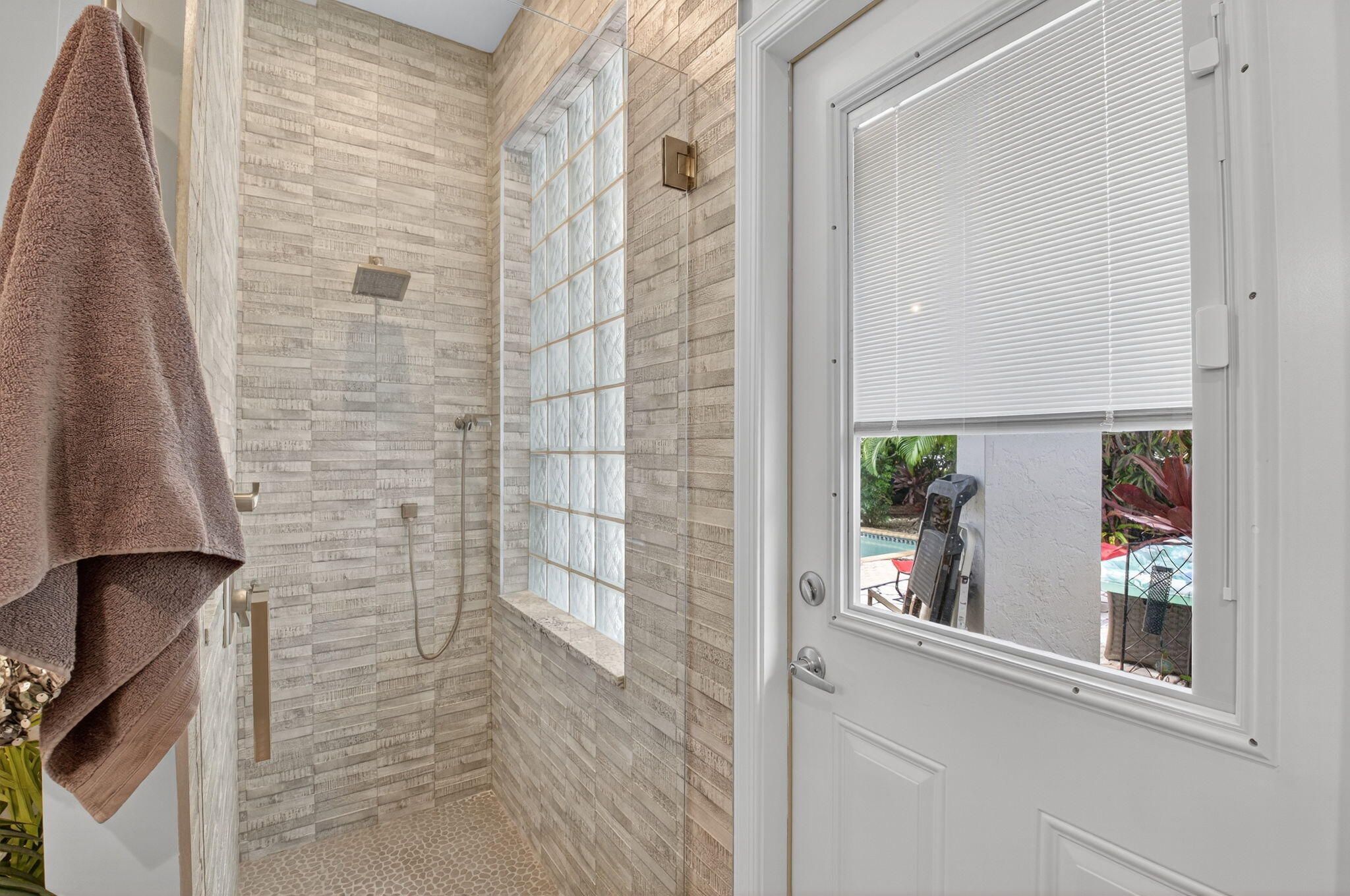 2423 Northwest 63rd Street Boca Raton, FL 33496 - Photo 27 of 83 a bathroom with a shower and a sink