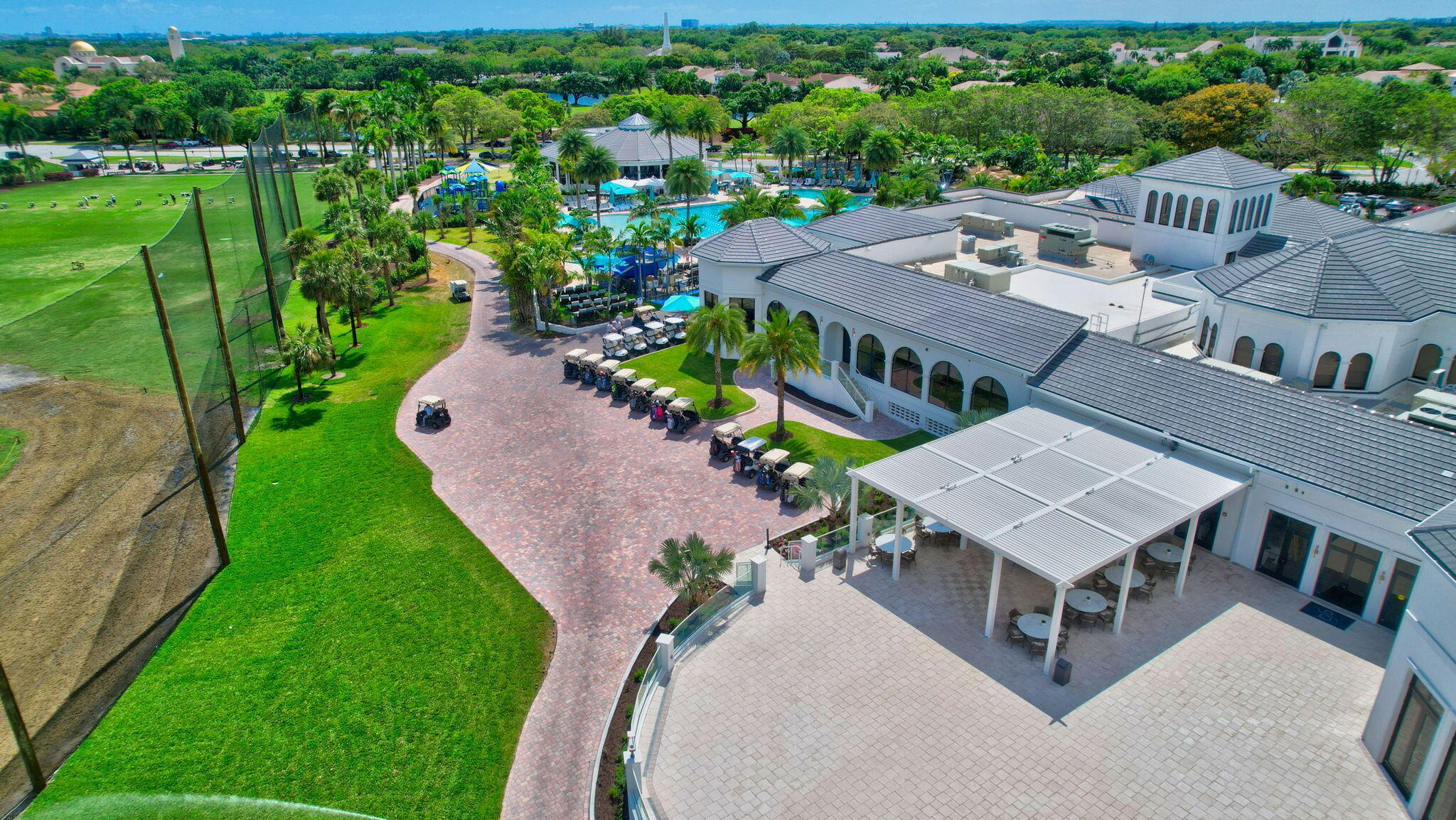 2423 Northwest 63rd Street Boca Raton, FL 33496 - Photo 62 of 83 an aerial view of a house with a garden