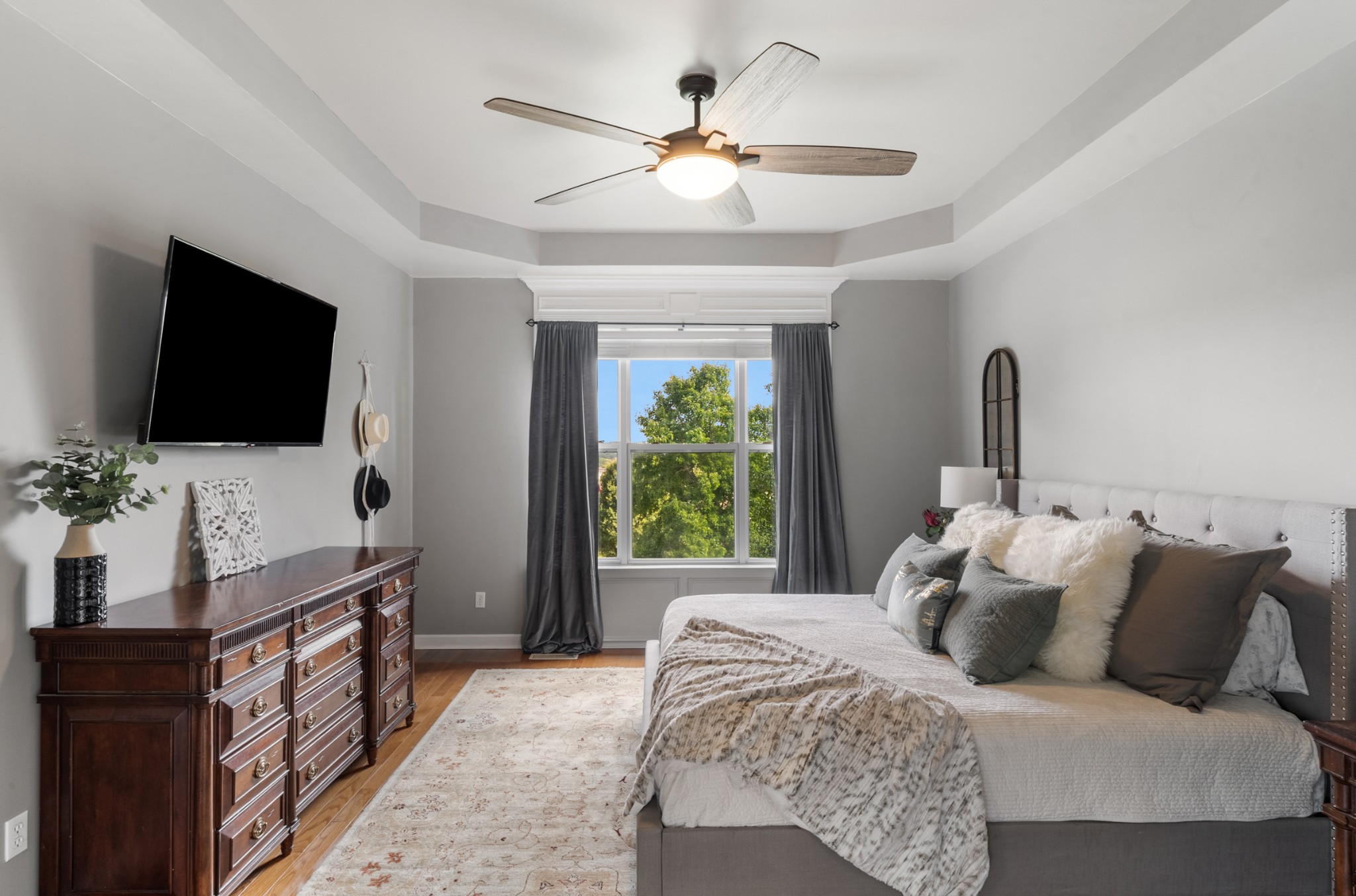 3029 Viewpointe Way Columbia, TN 38401 - Photo 12 of 29 a bedroom with a large bed and a flat screen tv