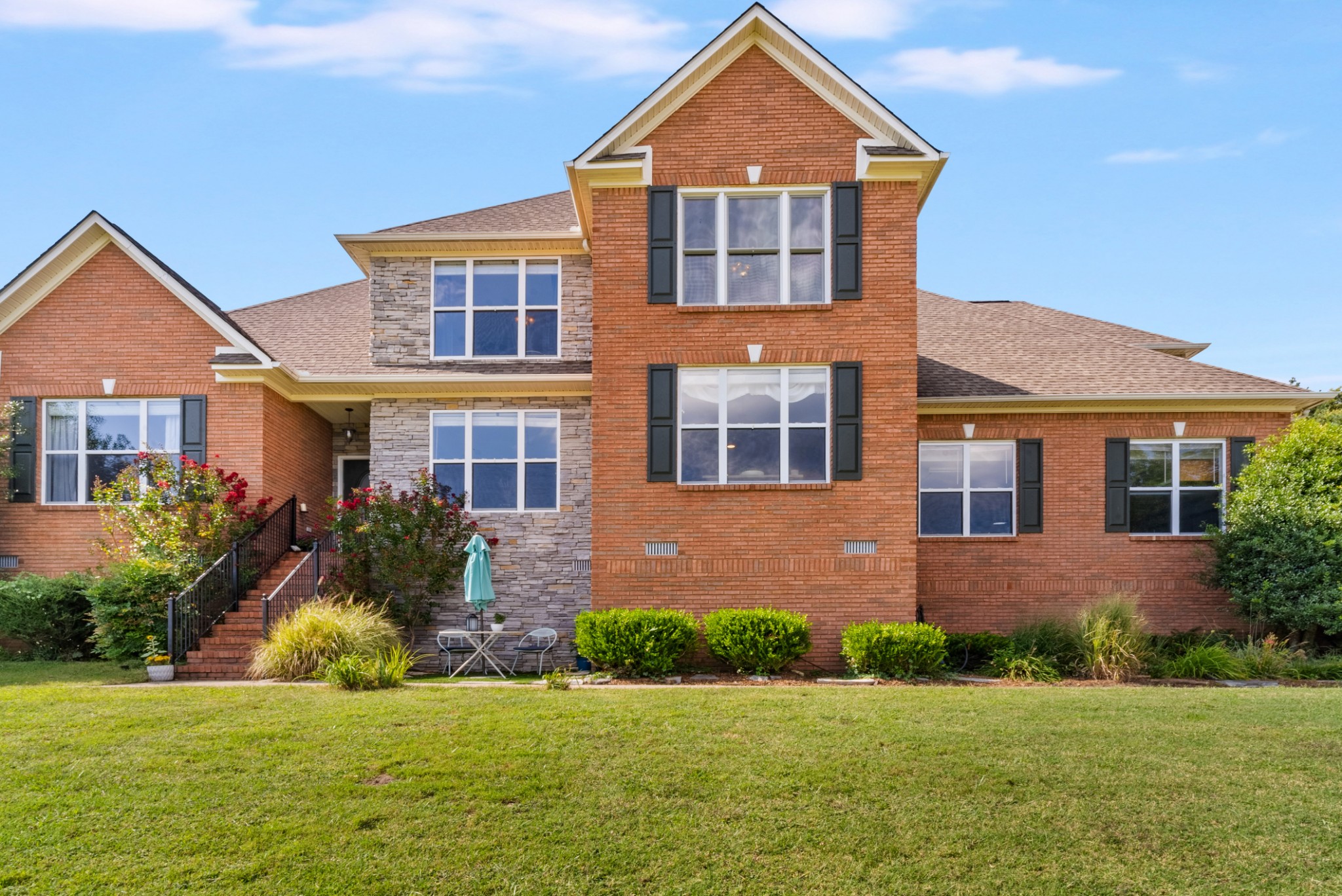 3029 Viewpointe Way Columbia, TN 38401 - Photo 2 of 29 a front view of a house with a yard and garage