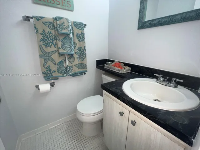 a view of building with outdoor space and sitting area