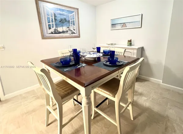 a view of a dining room with furniture