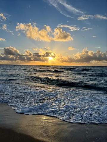 a kitchen with appliances and cabinets