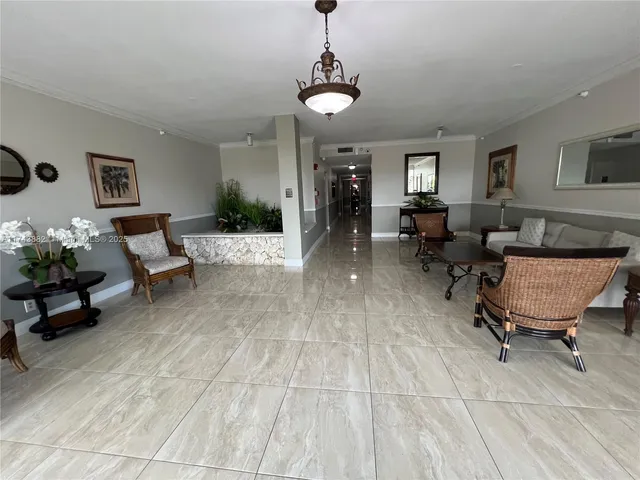 a view of room with flat screen tv cabinet and flat screen tv