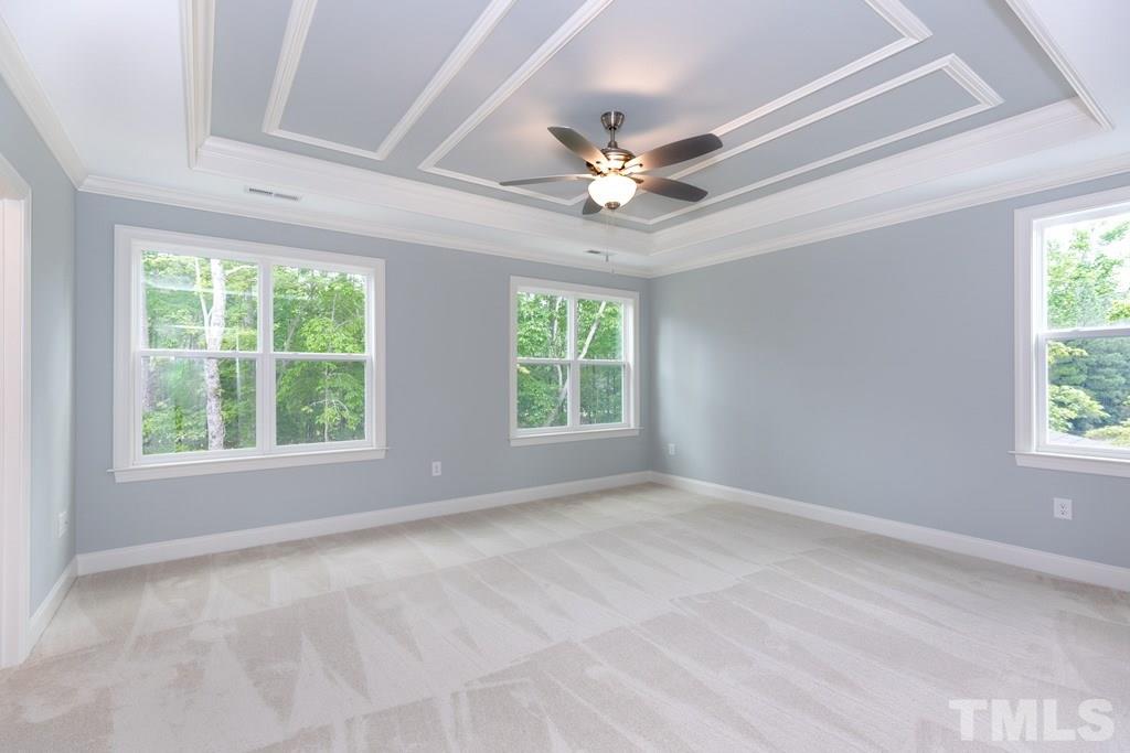 8000 Ghost Pony Trail Raleigh, NC 27613 - Photo 11 of 30 a view of an empty room with a window